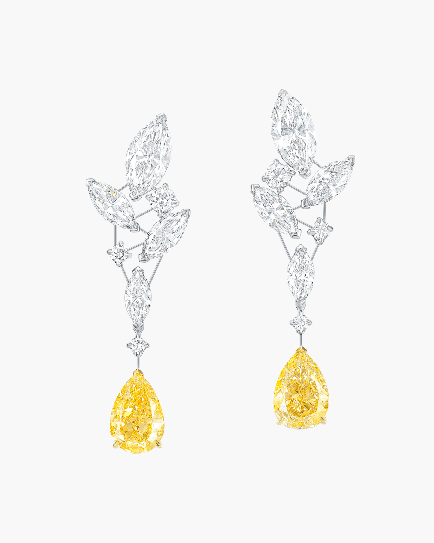 4.69 carat Pear Shape Fancy Yellow and White Diamond Earrings