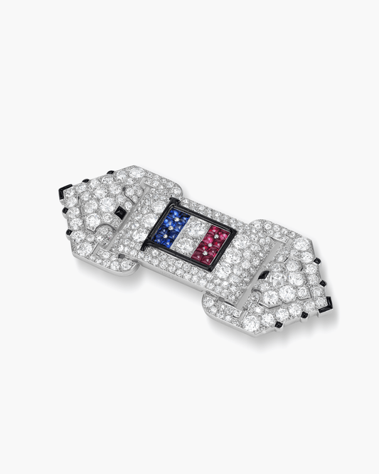 Art Deco Diamond, Sapphire, Ruby, Enamel and Onyx Brooch by Cartier