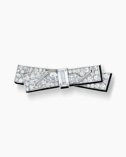 Art Deco Diamond and Onyx Bow Knot Brooch by Cartier