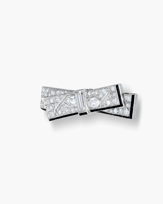Art Deco Diamond and Onyx Bow Knot Brooch by Cartier