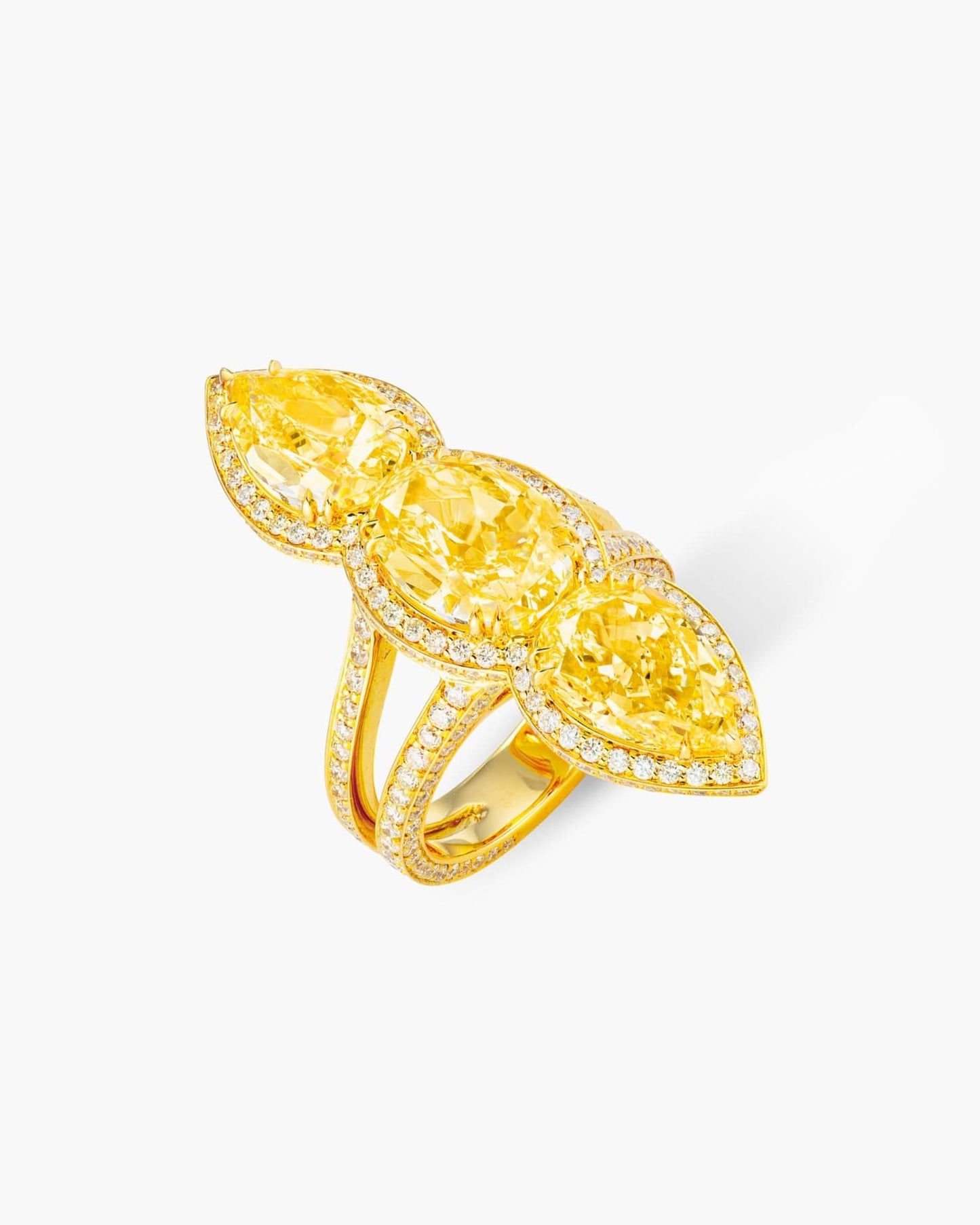 Three-Stone Oval and Pear Shape Yellow Diamond Ring