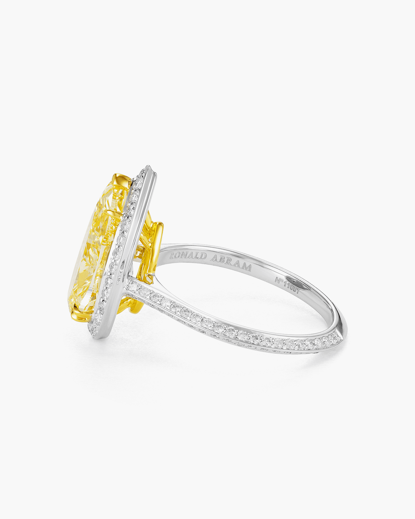 3.71 carat Pear Shape Yellow and White Diamond Ring