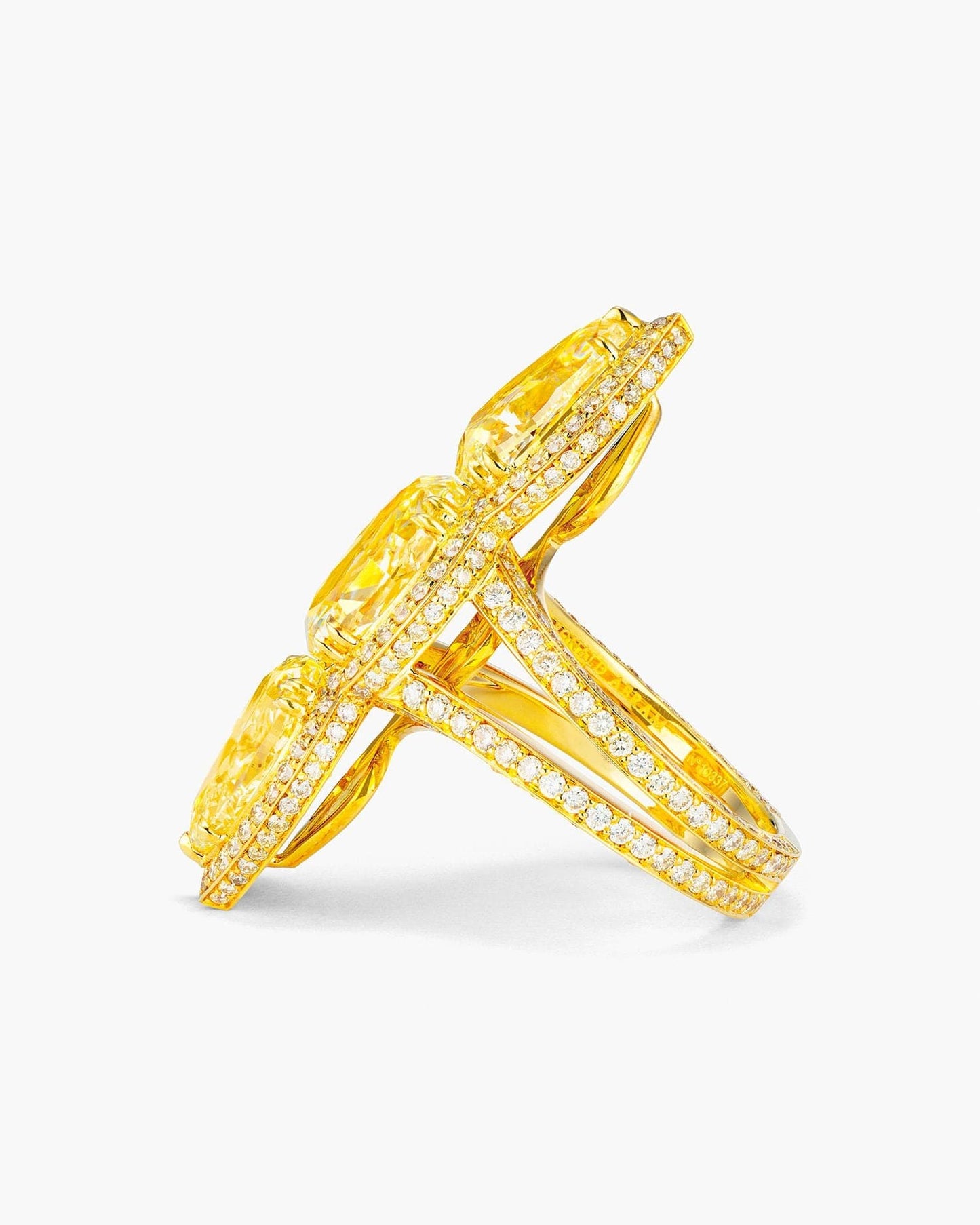 Three-Stone Oval and Pear Shape Yellow Diamond Ring