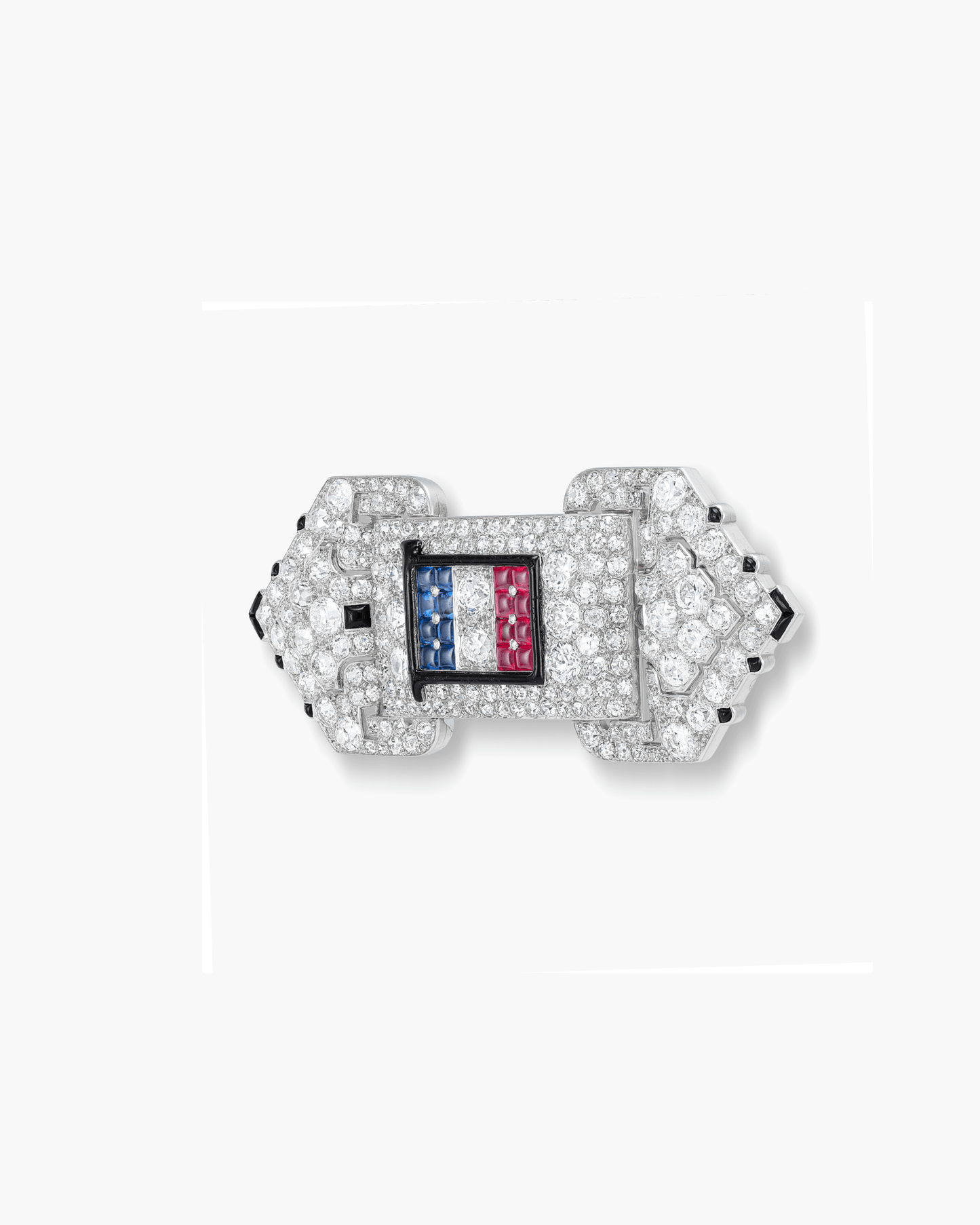 Art Deco Diamond, Sapphire, Ruby, Enamel and Onyx Brooch by Cartier