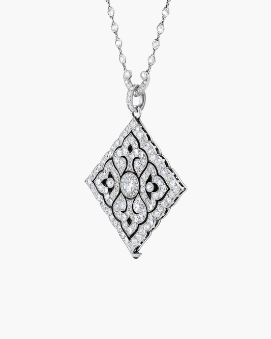 Edwardian Diamond and Sapphire White Enamel Pendant Watch by Cartier