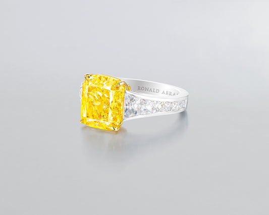 5.02 carat Cushion Cut Fancy Intense Yellow Diamond Ring